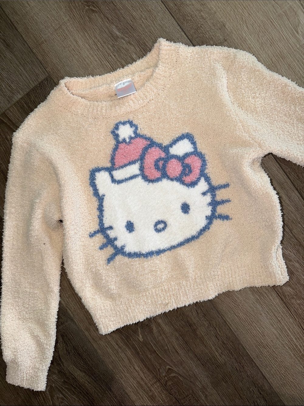 Hello Kitty Cream Fuzzy Pullover with Pink Bow and Blue Outline